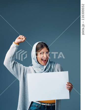 Sign, protest and muslim woman in studio, mockup and empowerment on gray background. Product placement, sale and deal for retail advert with excited model, Arabic and hijab with fist for portrait Sign, protest and muslim woman in studio, mockup and empowerment on gray background. Product placement, sale and deal for retail advert with excited model, Arabic and hijab with fist for portrait 116300032