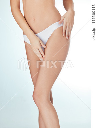 Woman, underwear and legs in studio for health, wellness and hair removal with model aesthetic. Girl, lingerie and natural body with epilation or waxing for shaving transformation on white background Woman, underwear and legs in studio for health, wellness and hair removal with model aesthetic. Girl, lingerie and natural body with epilation or waxing for shaving transformation on white background 116300118
