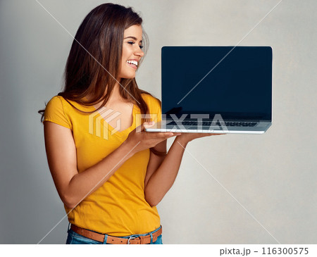 Woman, laptop screen and product for advertising, smile for promotion and mockup on white background. Computer, happy girl or digital marketing with technology, app and presentation in studio 116300575
