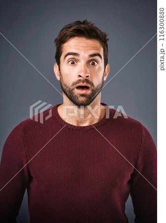 Studio, shocked and man with news, portrait and gossip of discount, wow and and rumor in mockup space. Gray background, face and person with shock, secret and fear for phobia and scared with alert Studio, shocked and man with news, portrait and gossip of discount, wow and and rumor in mockup space. Gray background, face and person with shock, secret and fear for phobia and scared with alert 116300880