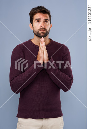 Studio, worship and man pray for faith, praise and asking for help, Jesus Christ and religion of Christianity. Blue background, hands and respect for God, spiritual and holy with belief of Heaven Studio, worship and man pray for faith, praise and asking for help, Jesus Christ and religion of Christianity. Blue background, hands and respect for God, spiritual and holy with belief of Heaven 116301224