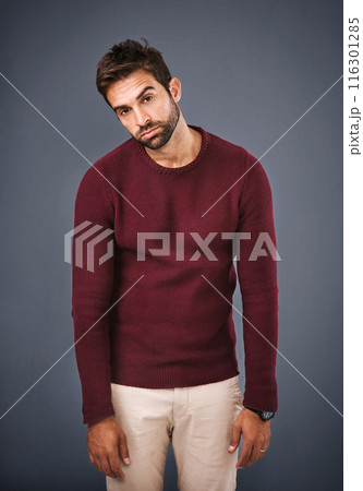 Studio, employee and portrait of man, sad and bored in sweater, serious and thinking of career as journalist. Gray background, entrepreneur and person in jersey, unhappy and tired of business 116301285