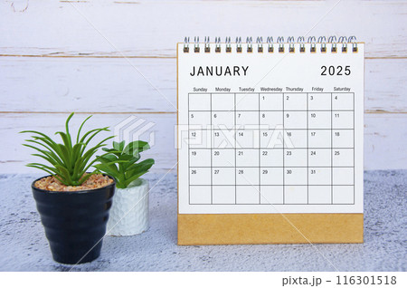 January 2025 calendar with white wooden wall background. New month and calendar concept 116301518