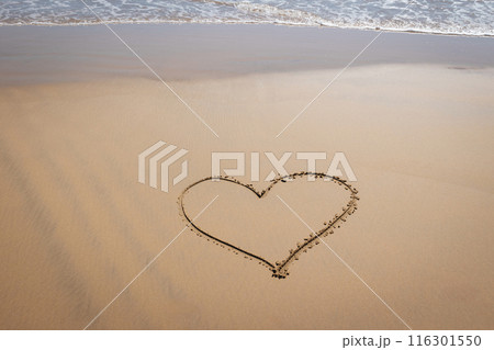 Heart shape drawn on the beach Heart shape drawn on the beach 116301550