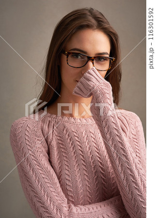 Portrait, woman and glasses in studio pink background for eyewear, optometry and clear vision. Confident, female person and spectacles isolated against backdrop for fashion, cosmetics and wellness 116301592