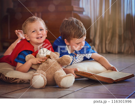 Boy, twins and happy with playing in home on floor with toys for fun, child development and growth. Toddler, kids and smile with teddy bear or book for childhood memories, playful and siblings 116301996