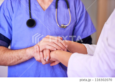 Hands, doctor and patient for help or support in healthcare with care, comfort and advice. People, appointment and consultation in hospital with trust or kindness and hope for wellness and wellbeing 116302070