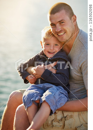 Father, son and portrait for adventure, holiday and together with love by water or pier. Family, man and child on vacation in California with happiness, relationship and summer at ocean on jetty Father, son and portrait for adventure, holiday and together with love by water or pier. Family, man and child on vacation in California with happiness, relationship and summer at ocean on jetty 116302098