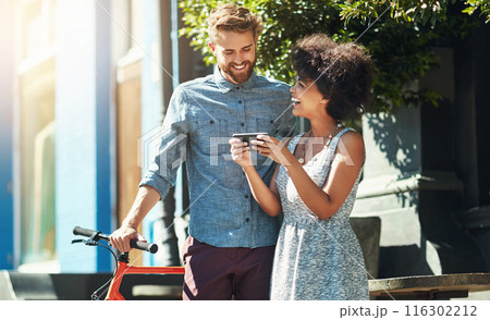 Phone, bicycle and couple on street with smile, connection and networking on social media. Smartphone, happy man and woman in city with mobile app, bike or online communication for sustainable travel 116302212