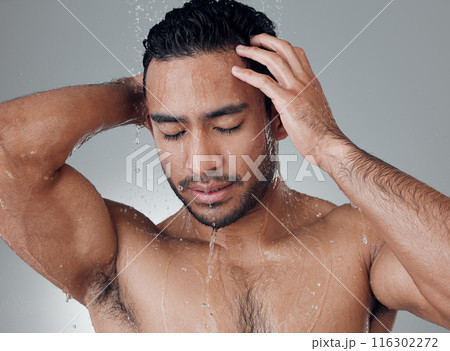 Shower, thinking and man in water with splash, topless and wellness on gray background. Skincare, relaxation and male person in bathroom with luxury, cleanliness and grooming or refreshment at home Shower, thinking and man in water with splash, topless and wellness on gray background. Skincare, relaxation and male person in bathroom with luxury, cleanliness and grooming or refreshment at home 116302272