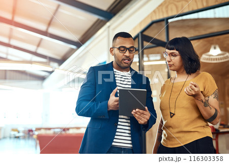 Discussion, tablet and business people in office for meeting, online planning and internet. Creative agency, teamwork and man and woman on digital tech for research project, website and consulting 116303358