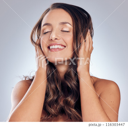 Growth, hair beauty and happy woman for skincare, wellness by grey background and hairstyle. Face, model haircare and healthy for cosmetics, dermatology treatment and makeup with smile in studio 116303447