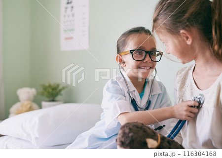 Girls, play and doctor with dress up, children and fun with game, fantasy and pretend with stuffed toy. Happy, kids and medical costume with weekend break and career choice for development or joy Girls, play and doctor with dress up, children and fun with game, fantasy and pretend with stuffed toy. Happy, kids and medical costume with weekend break and career choice for development or joy 116304168