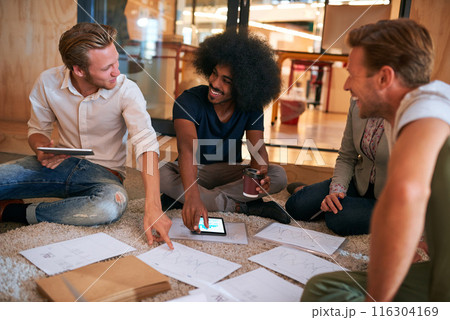 Creative people, tablet and meeting with documents in office for kpi planning, teamwork or solution. Employees, tech and paperwork with graph on floor for sales analysis, strategy or review of growth Creative people, tablet and meeting with documents in office for kpi planning, teamwork or solution. Employees, tech and paperwork with graph on floor for sales analysis, strategy or review of growth 116304169