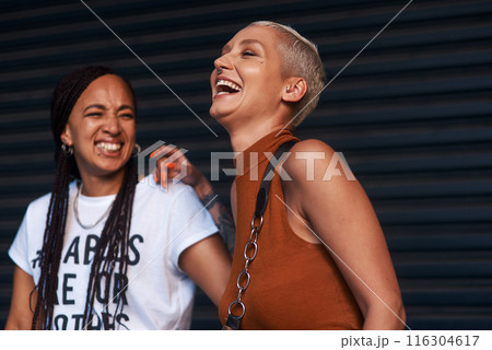 Girls, people and laughing in fashion outdoor with streetwear, casual style and trendy outfit with confidence. Friends, face and happy in city with bonding, embrace and funny joke in town in summer 116304617