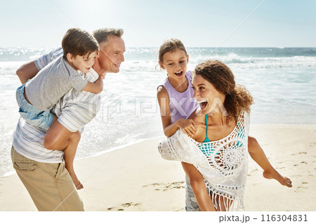 Happy family, walking and piggyback at beach in summer for relax, travel and holiday in Miami. Parents, children and people at ocean with back ride for vacation, trust and bonding together by water Happy family, walking and piggyback at beach in summer for relax, travel and holiday in Miami. Parents, children and people at ocean with back ride for vacation, trust and bonding together by water 116304831