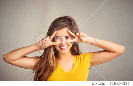 Portrait, hands and woman with peace sign in studio with smile for happiness, good mood or face expression on white background. V, emoji and female model for gesture, positivity or confidence 116304885
