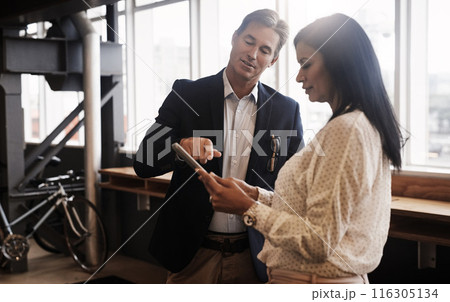 Employees, tablet and speaking in office on app for planning, communication and teamwork on website. Business people, meeting and talking on agenda or feedback on report or proposal, online and staff 116305134