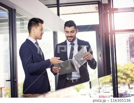 Business people, teamwork and discussion of document or legal case for advice in office at law firm. Professional men, attorney or lawyers with portfolio for article, report or planning of solution 116305136