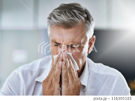 Businessman, sneeze by nose and sick with allergy, covid or virus in company office. Mature employee, tissue paper and manager for sinusitis for health problem, cold fever and bacteria in winter 116305183