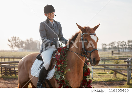 Horse, woman and sunshine on ranch or farm for fitness, training and sport or competition. Event, animal and female jockey with flowers in countryside for course, dressage and performance in Texas 116305499