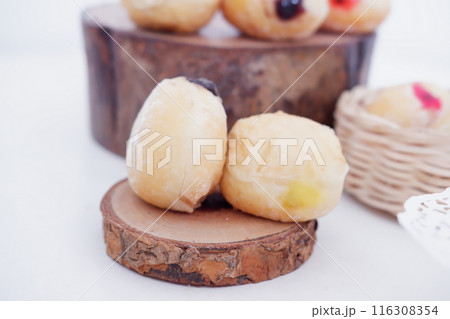 flavored ball donuts as a background flavored ball donuts as a background 116308354