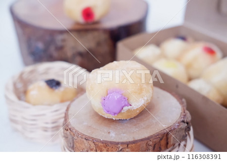 flavored ball donuts as a background flavored ball donuts as a background 116308391