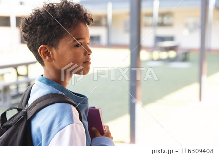 Biracial boy at school, with copy space 116309408