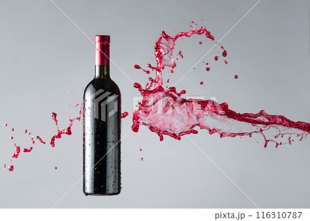 Bottle of red wine and splashes. Bottle of red wine and splashes. 116310787