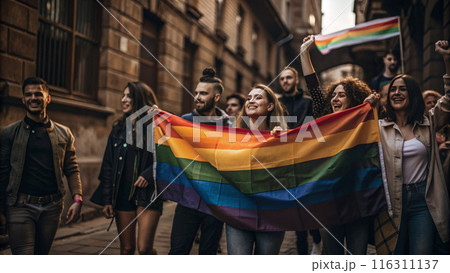 People holding rainbow flags  116311137