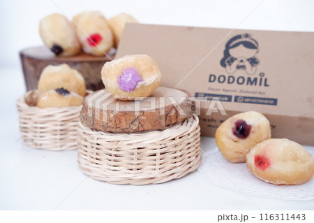 flavored ball donuts as a background flavored ball donuts as a background 116311443