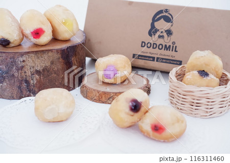 flavored ball donuts as a background flavored ball donuts as a background 116311460