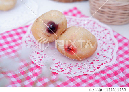 flavored ball donuts as a background flavored ball donuts as a background 116311486