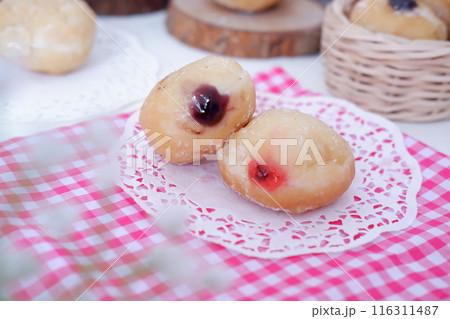 flavored ball donuts as a background flavored ball donuts as a background 116311487