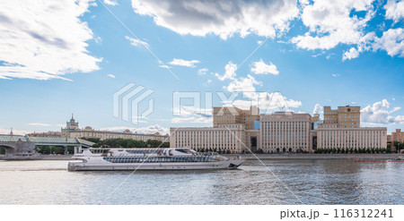 View of the Ministry of Defence of Russian Federation, and Moscow river embakment with cruise ships at sunset. View of the Ministry of Defence of Russian Federation, and Moscow river embakment with cruise ships at sunset. 116312241
