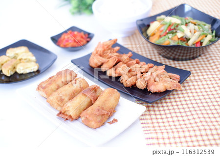 Indonesian food. lunch menu, rice with shrimp and side dishes Indonesian food. lunch menu, rice with shrimp and side dishes 116312539