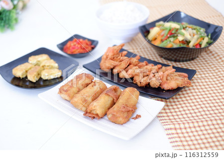 Indonesian food. lunch menu, rice with shrimp and side dishes Indonesian food. lunch menu, rice with shrimp and side dishes 116312559