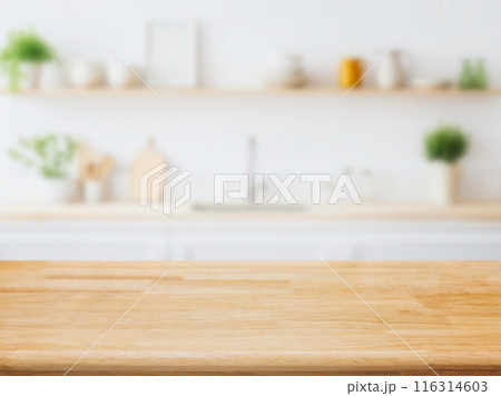 Wood table top on blurred kitchen background. can be used mock up for montage products display or design layout. Wood table top on blurred kitchen background. can be used mock up for montage products display or design layout. 116314603