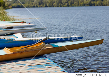 athlete putting on water kayak, water sport, kayaking and canoeing, olympic games 116316394