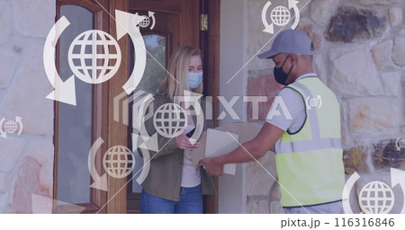 Image of media icons over caucasian woman with face mask taking package 116316846