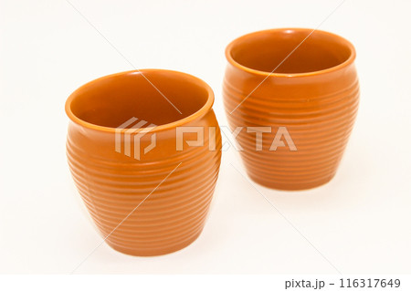 A picture of soil tea cup isolated on white background A picture of soil tea cup isolated on white background 116317649
