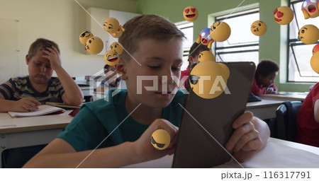 Image of multiple emoticons floating over diverse students studying and using digital tablet Image of multiple emoticons floating over diverse students studying and using digital tablet 116317791