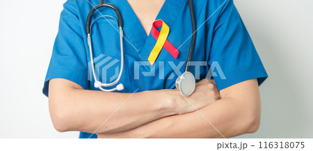 World hepatitis day awareness month, 28 July. Doctor holding Red and Yellow ribbon. Liver cancer, Jaundice, Cirrhosis, Failure, Enlarged, Hepatic Encephalopathy and Health concept World hepatitis day awareness month, 28 July. Doctor holding Red and Yellow ribbon. Liver cancer, Jaundice, Cirrhosis, Failure, Enlarged, Hepatic Encephalopathy and Health concept 116318075