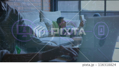 Image of connected icons, connected dots over midsection of african american man using laptop 116318824