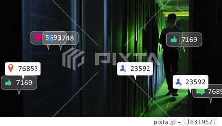 Animaton of social media icons against asian male engineer using laptop at computer server room Animaton of social media icons against asian male engineer using laptop at computer server room 116319521
