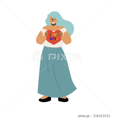 Young woman stands and holds a heart on which is the text Love Wins. 116323515