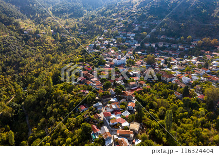 Aerial view of mountain village of Pedoulas surrounded by lush green forest. Nicosia District, Cyprus Aerial view of mountain village of Pedoulas surrounded by lush green forest. Nicosia District, Cyprus 116324404