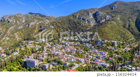Bellapais Abbey ruins dominating Pentadaktylos mountains and town landscape. Kyrenia, Cyprus 116324414