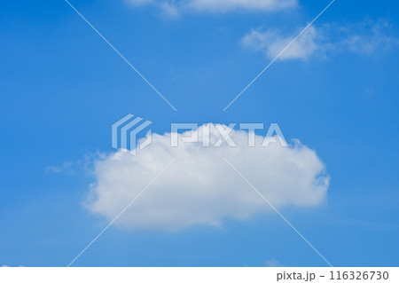 beautiful blue sky and white fluffy single cloud with sunrise in the morning, natural background beautiful blue sky and white fluffy single cloud with sunrise in the morning, natural background 116326730