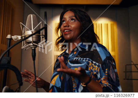 Vocalist Rehearsing Her New Song Vocalist Rehearsing Her New Song 116326977